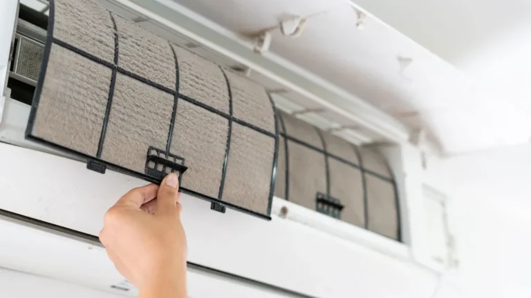 How do I clean an AC filter?